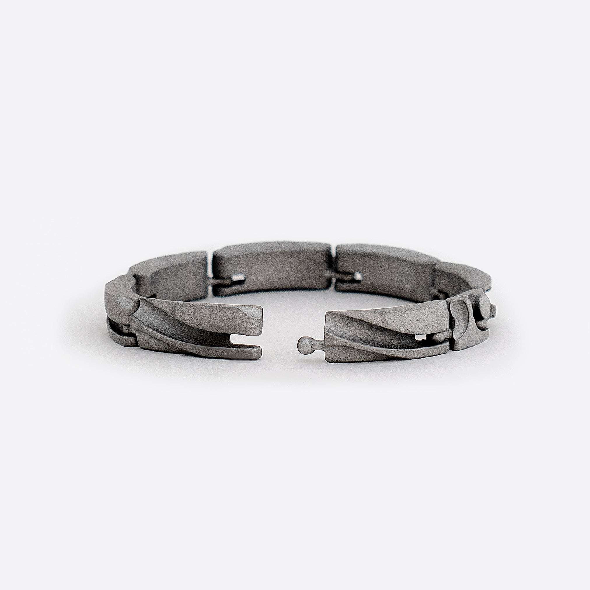 Modern link bracelet with ball joint connections in matte stainless steel