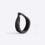 Amos Bold Steel Ring in gray with twisted band and precision edge detailing on white background