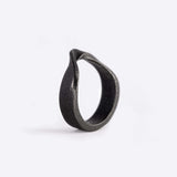 Amos Bold Steel Ring in gray with twisted band and precision edge detailing on white background