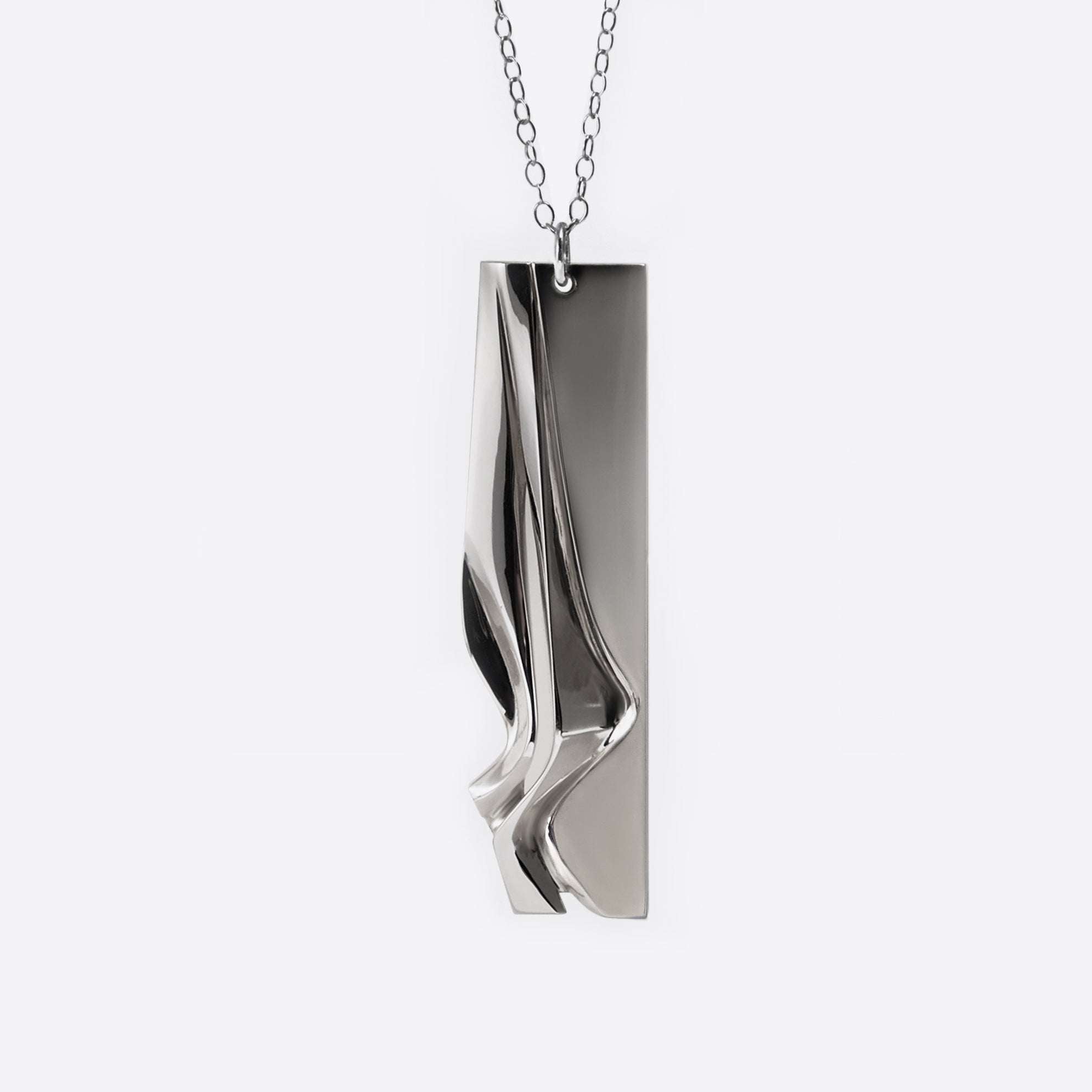 Nocturne Pendant sterling silver necklace with twisting, stacked curves and mirror finish