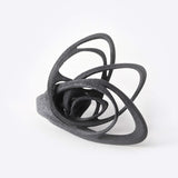 Black polished Papilio Nylon Ring with bold, elliptical petal design and intricate detailing