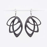 Orbis Steel Earrings in black with three elliptical petals and custom felt pouch