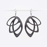 Orbis Steel Earrings in black with three elliptical petals and custom felt pouch