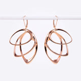 Rose gold Orbis earring with three elliptical petals in a cascading design, 1.7 by 1.2 inches.