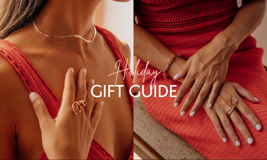 Woman wearing red dress showcasing elegant gold jewelry for holiday gift guide