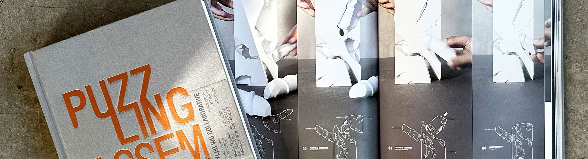 Open sketchbook with blank pages on a wooden surface