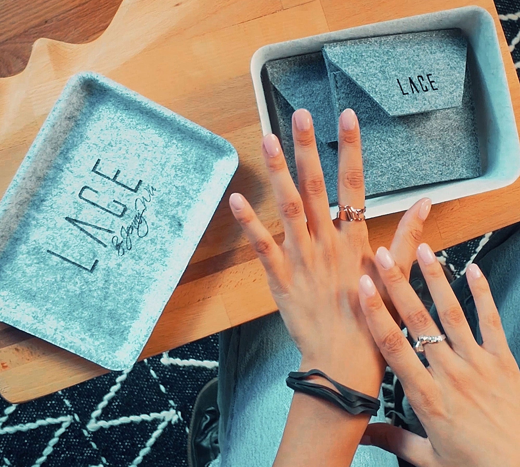 LACE Mystery Box with elegant silver jewelry pieces in reusable felt storage case