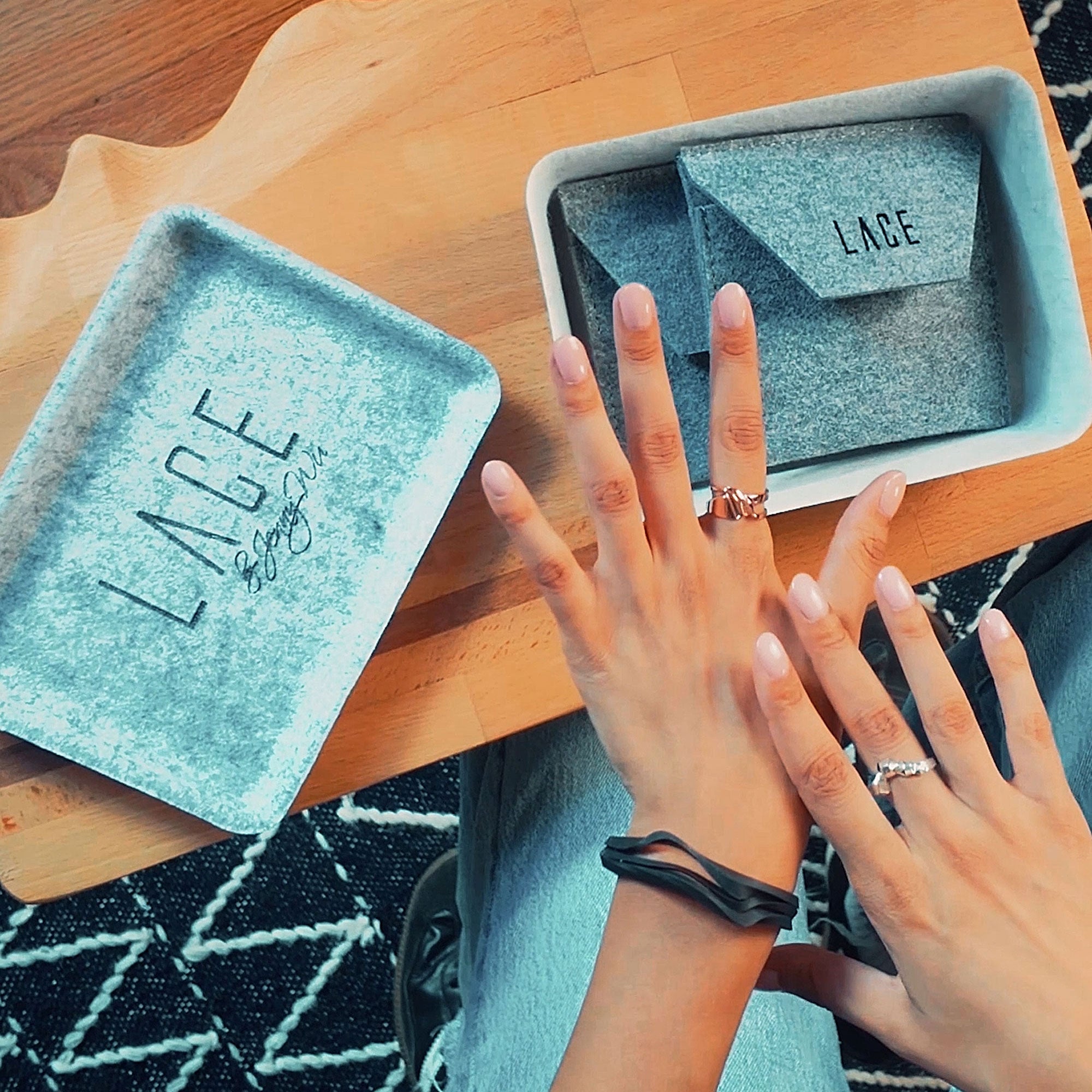 LACE Mystery Box with elegant silver jewelry pieces in reusable felt storage case