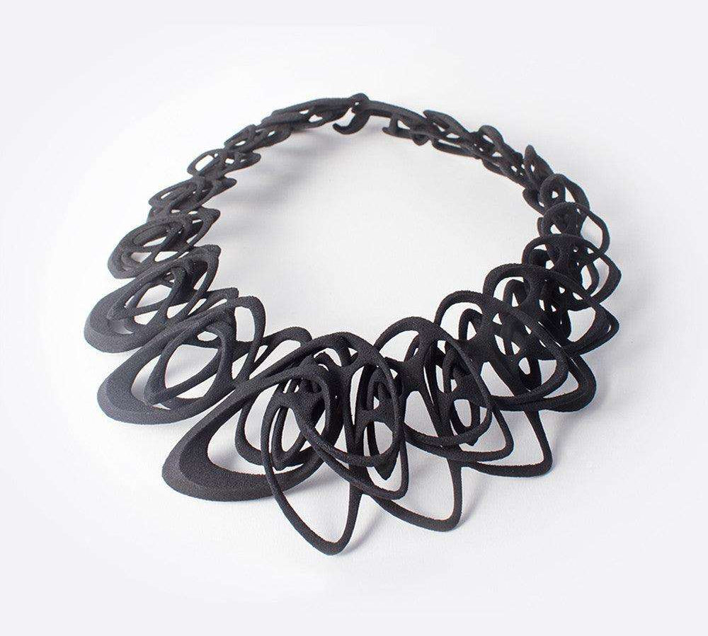 Black 3D printed Catena Necklace with interlocking elliptical petals made from flexible TPU polymer