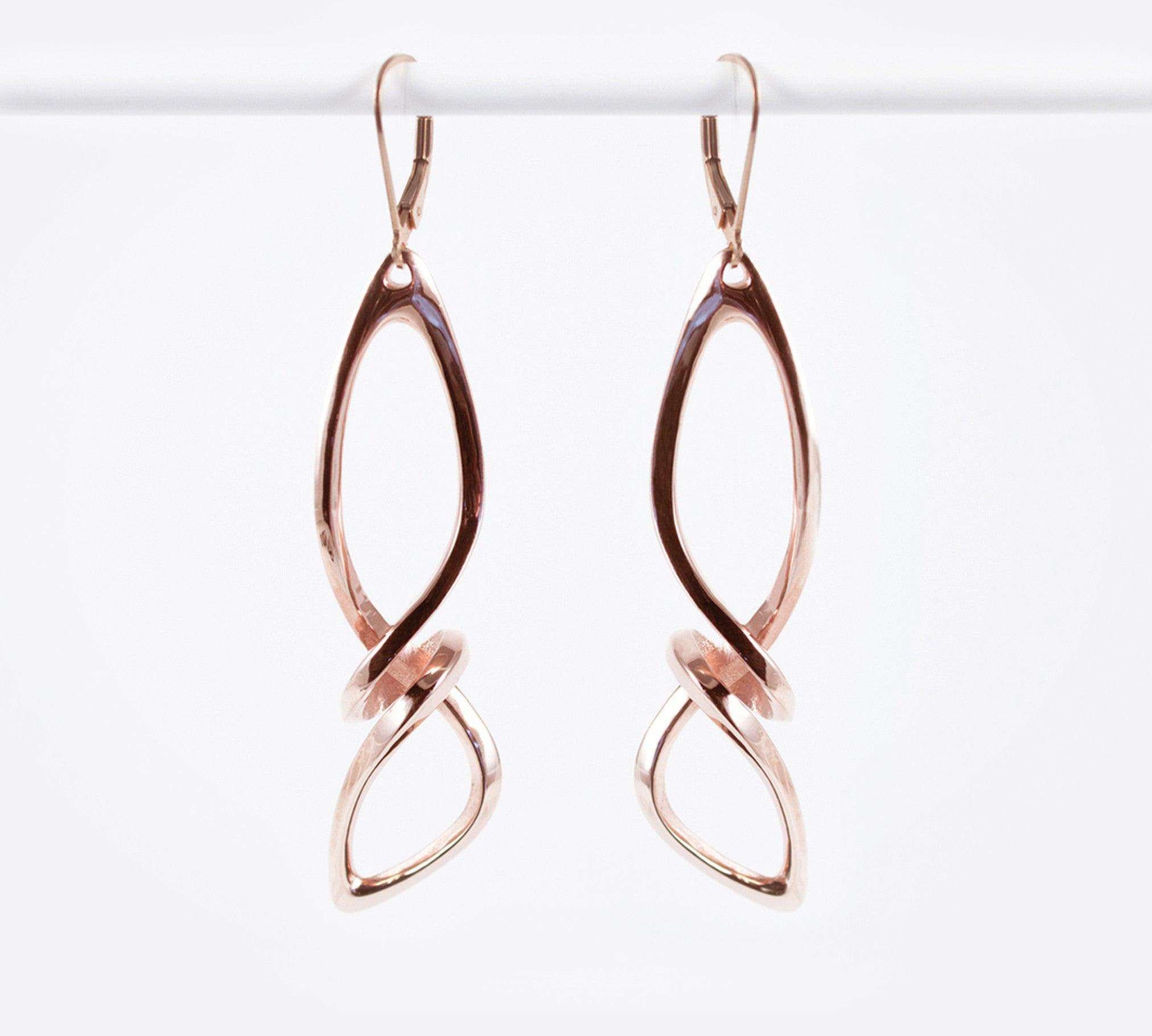 Centri Earrings in 18K rose gold vermeil with long loose knot design and elegant precision edge detailing