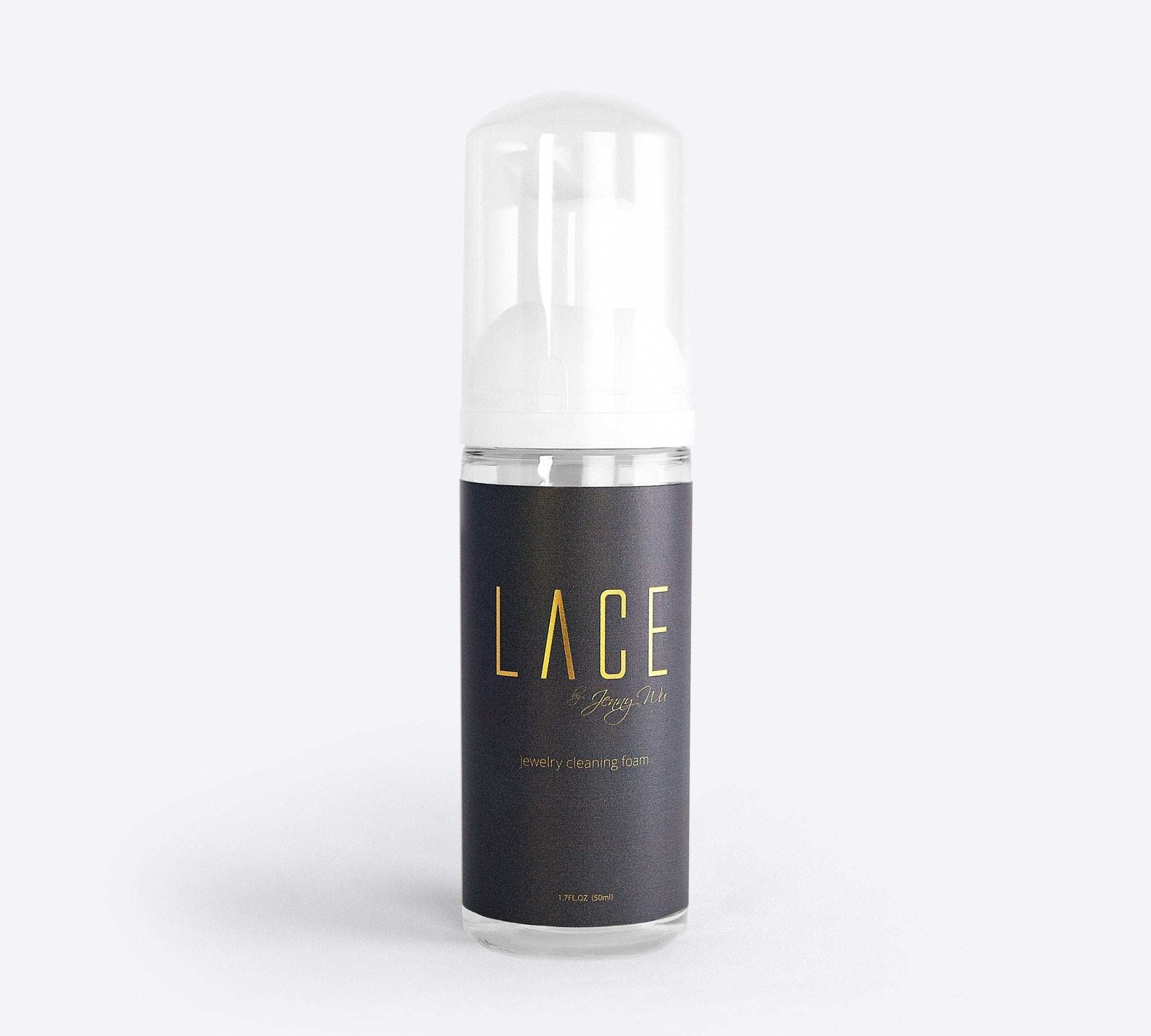 Bottle of non-toxic jewelry cleaning foam with small brush for gentle metal and gemstone care