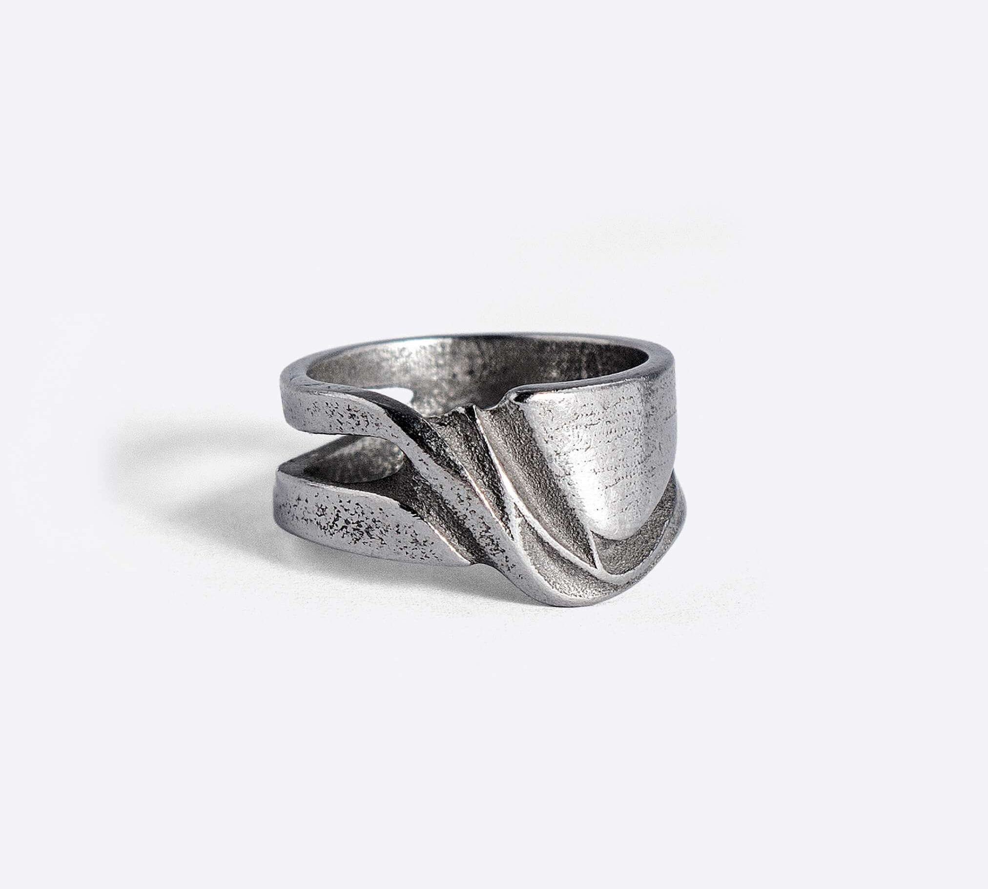 Velum Stainless Steel Ring with drapery-inspired curved design and open back in stainless steel 316