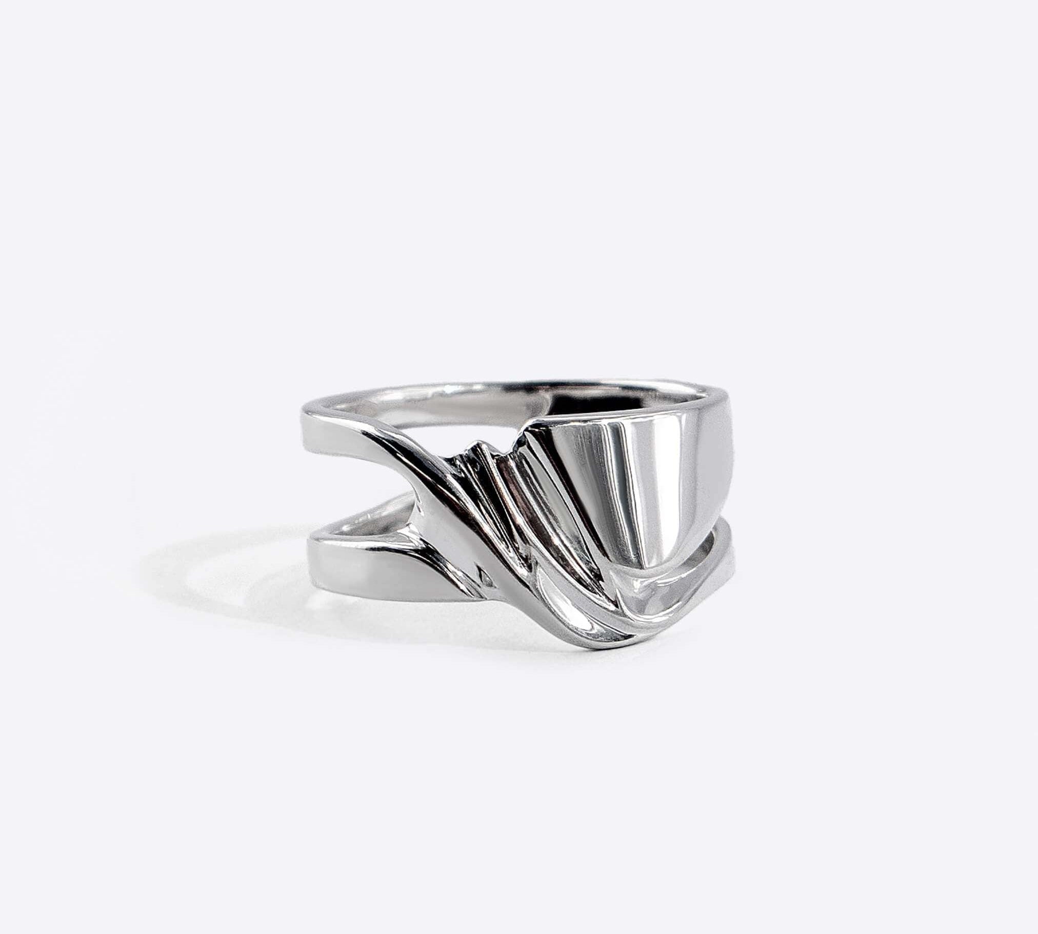 Velum Ring in sterling silver with drapery-inspired curved design and open back bands