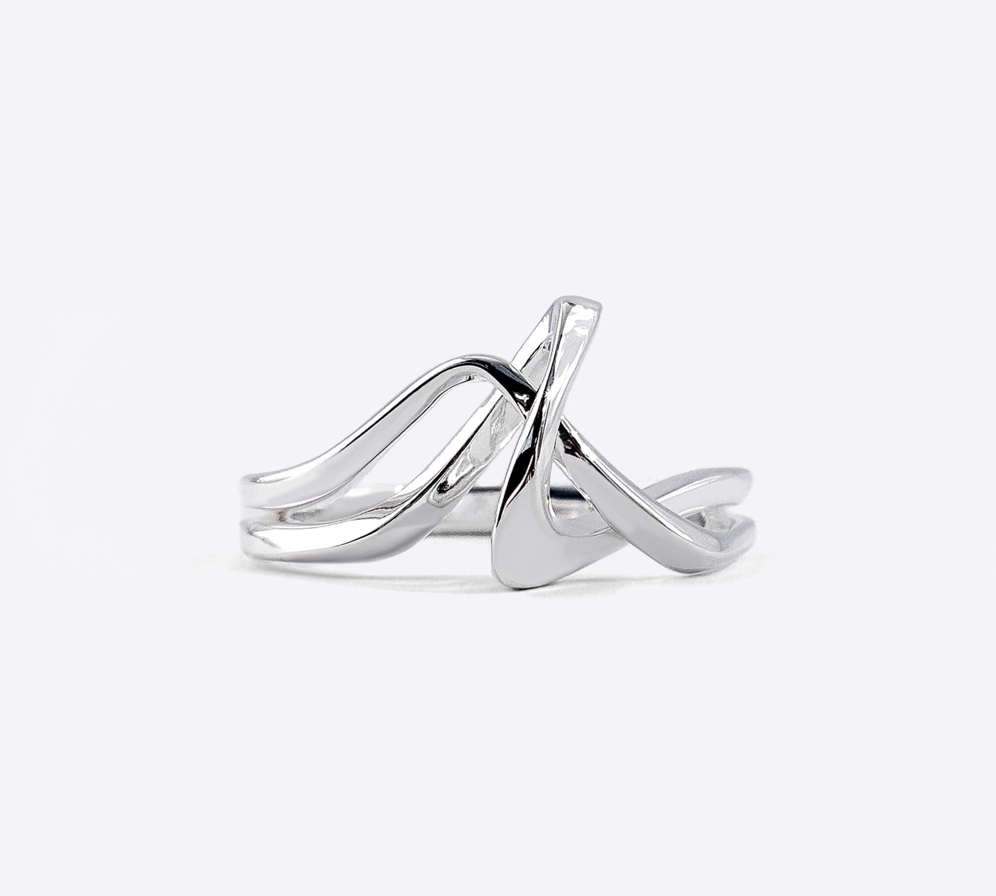 Sterling silver Amare Ring with a unique loose knot design and twisting lines