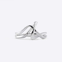 Sterling silver Amare Ring with a unique loose knot design and twisting lines