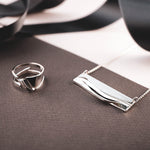 Adagio Velum Set sterling silver ring and pendant with rippling curves and precision edges