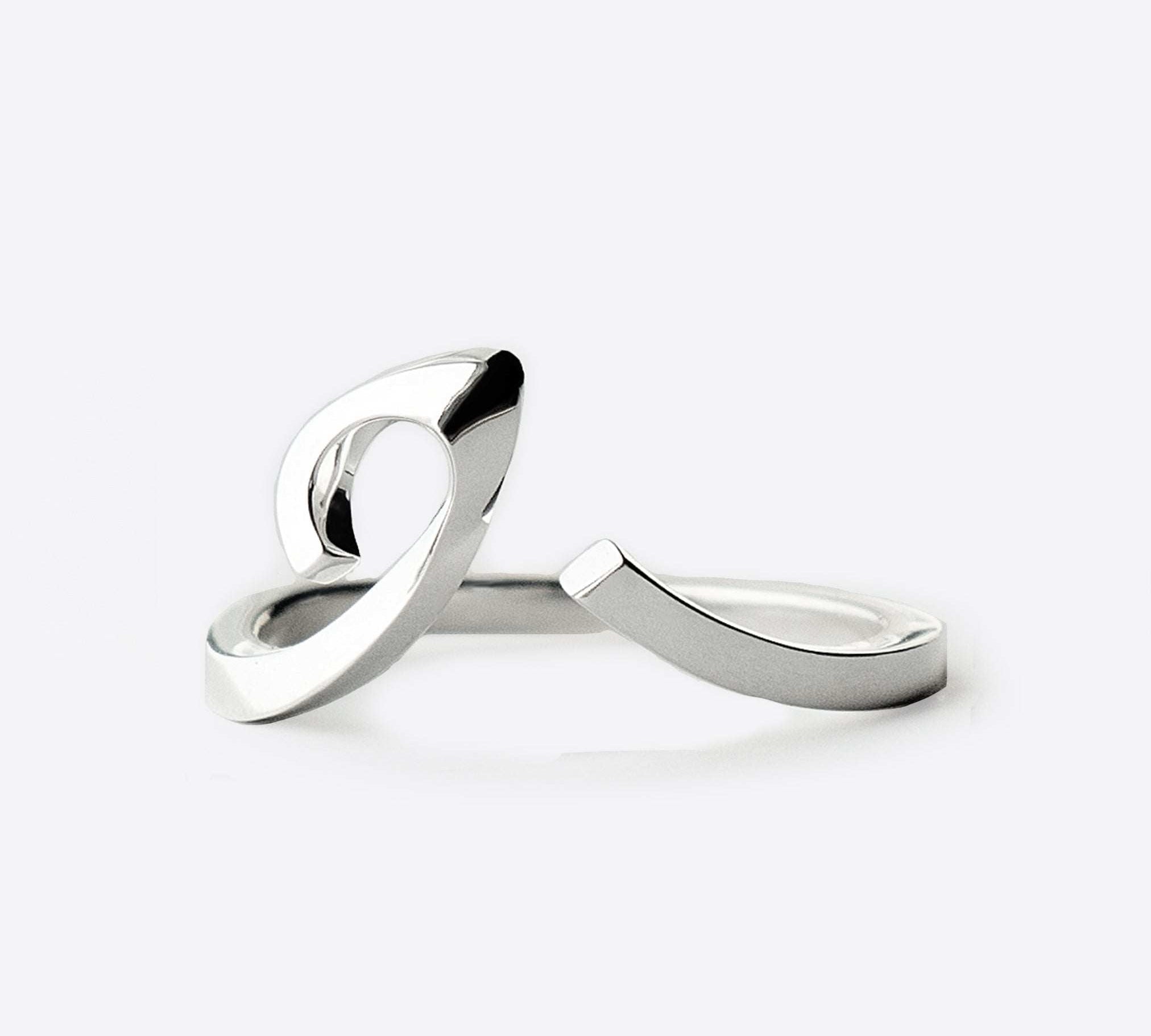 Sterling silver Hydra Ring with an open, adjustable curved design and sculpted oval loop for a modern look