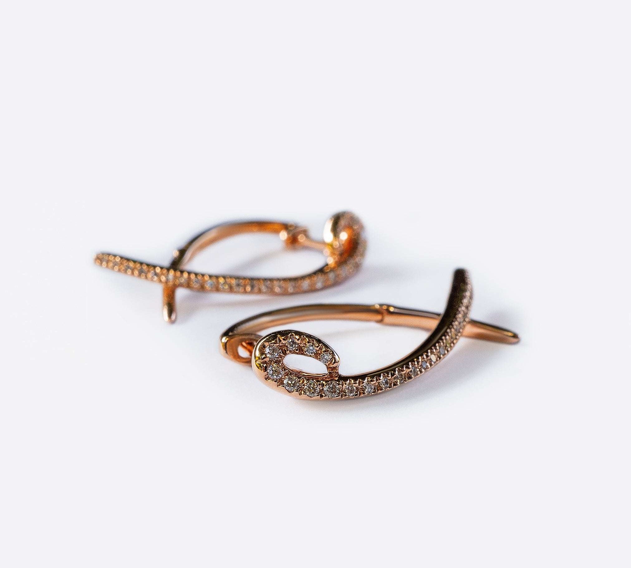 Hydra diamond earrings in 14K rose gold with 0.11 carats round-brilliant diamonds and a modern looped huggie design