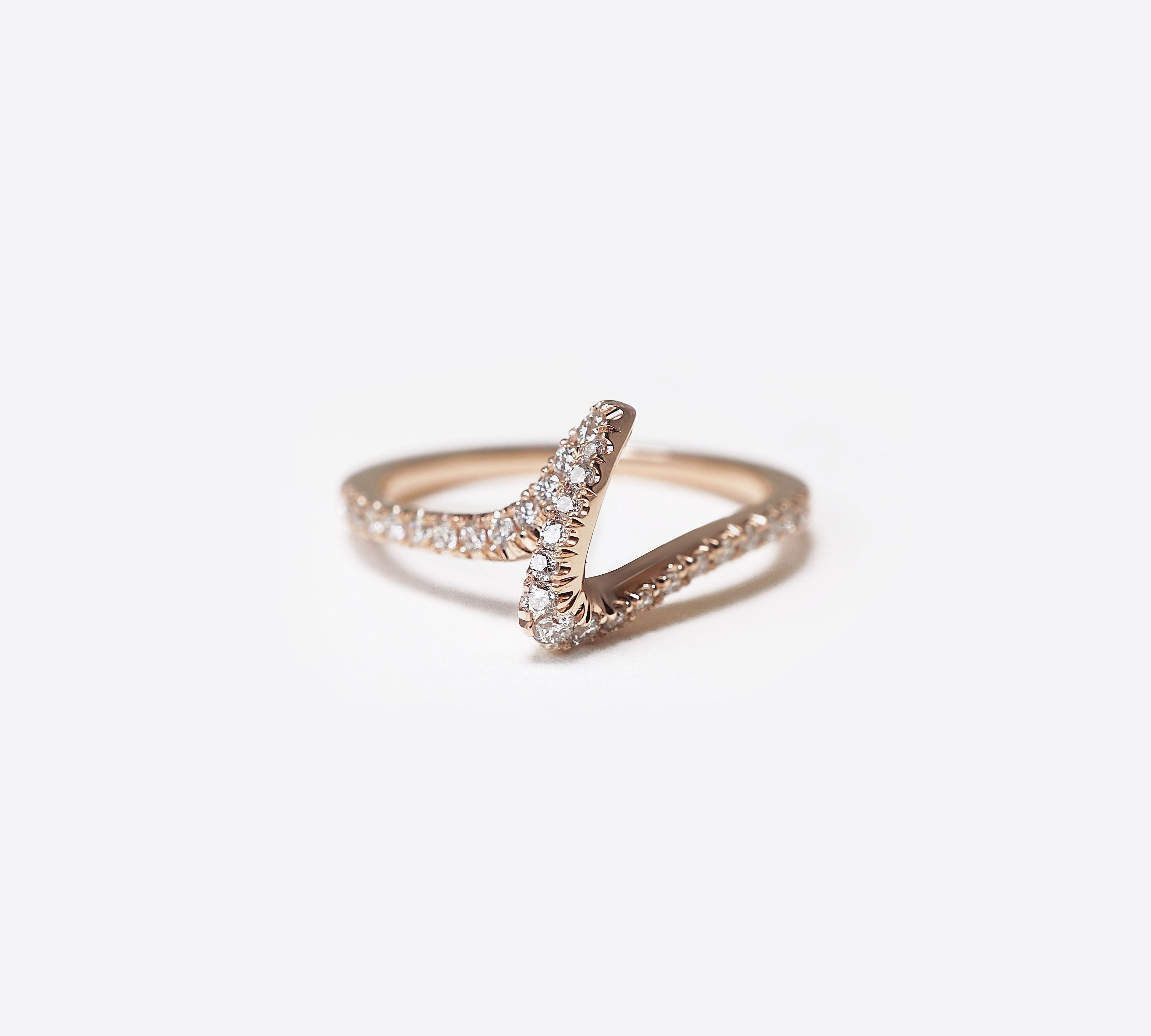 Elegant Sera wedding ring for women with delicate knot design in platinum and gold options