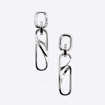 Sterling silver dangle earrings with three connected twisted square links, modern elegant design