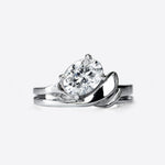 Close-up of a silver engagement ring with a large round diamond solitaire from the Engagement Ring Samples Set