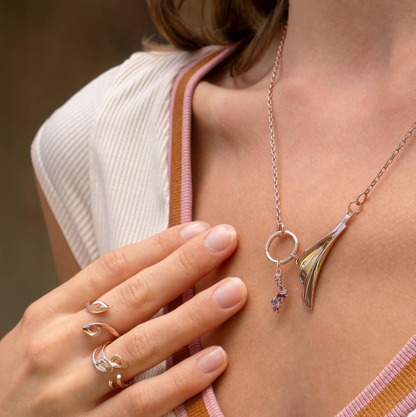 Leda gemstone necklace in 18K rose gold vermeil with amethyst and tourmaline pendant worn on model