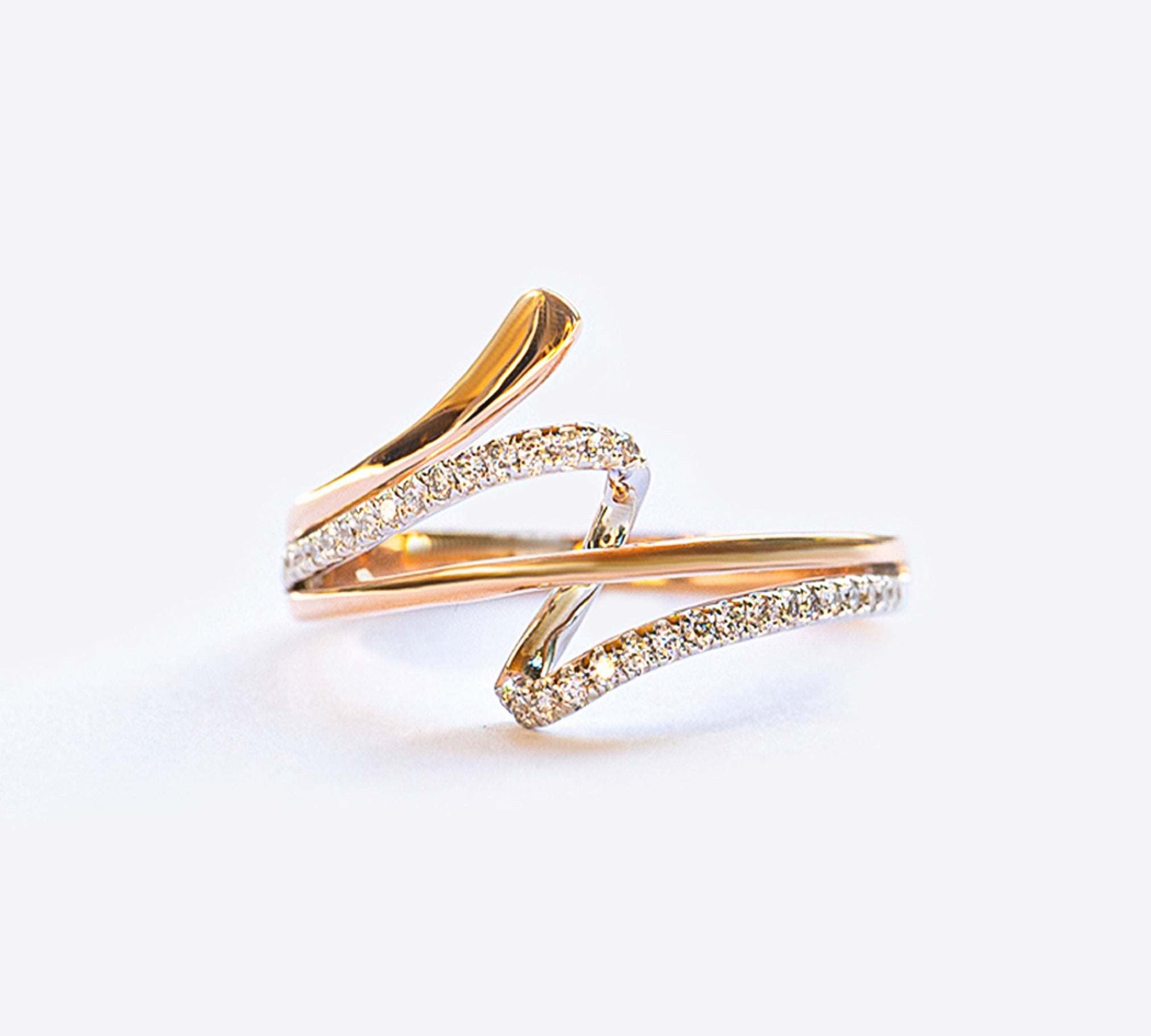 Vina Diamond Ring in 14K gold with intertwined bands and pave diamonds
