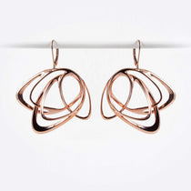 Rose gold Gemino earring with three interlocking elliptical petals design hanging on hooks