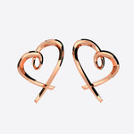 Pair of heart studs earrings with asymmetrical lace design in sterling silver and rose gold vermeil