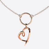 Modern Heart Charm necklace in sterling silver and rose gold vermeil with geometric design
