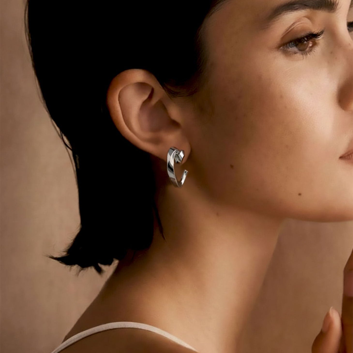 Heart Mini Hoop earrings with lace-like heart design in sterling silver and rose gold vermeil