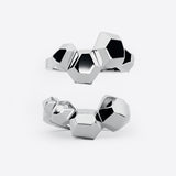 Sterling silver Hexa Rings Set featuring hexagonal geometric design with undulating surfaces, two rings designed to nest together forming a statement ring.