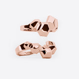 Rose gold Hexa Rings Set with hexagonal design and smooth undulating surfaces, two rings nest together as a statement piece
