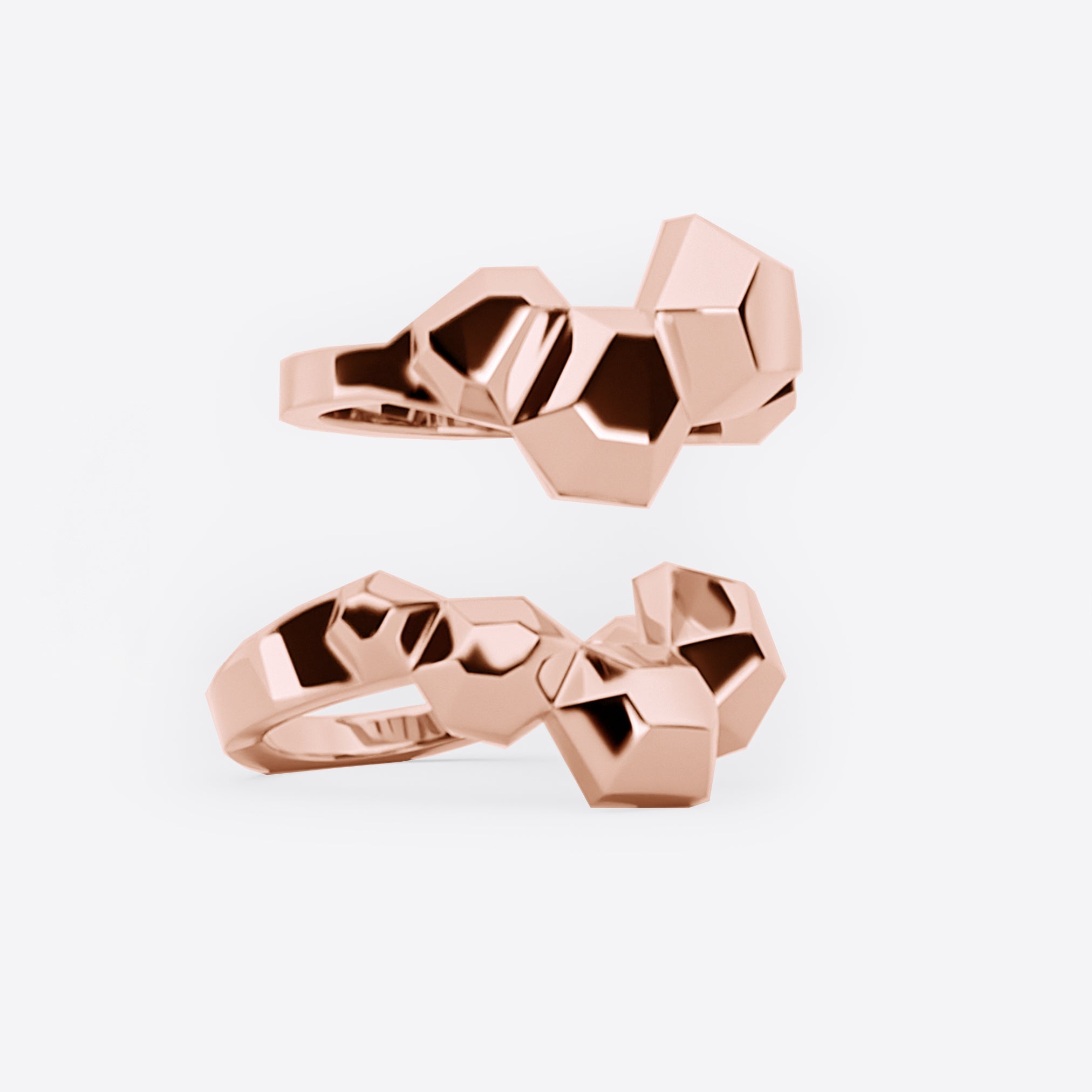 Rose gold Hexa Rings Set with hexagonal design and smooth undulating surfaces, two rings nest together as a statement piece