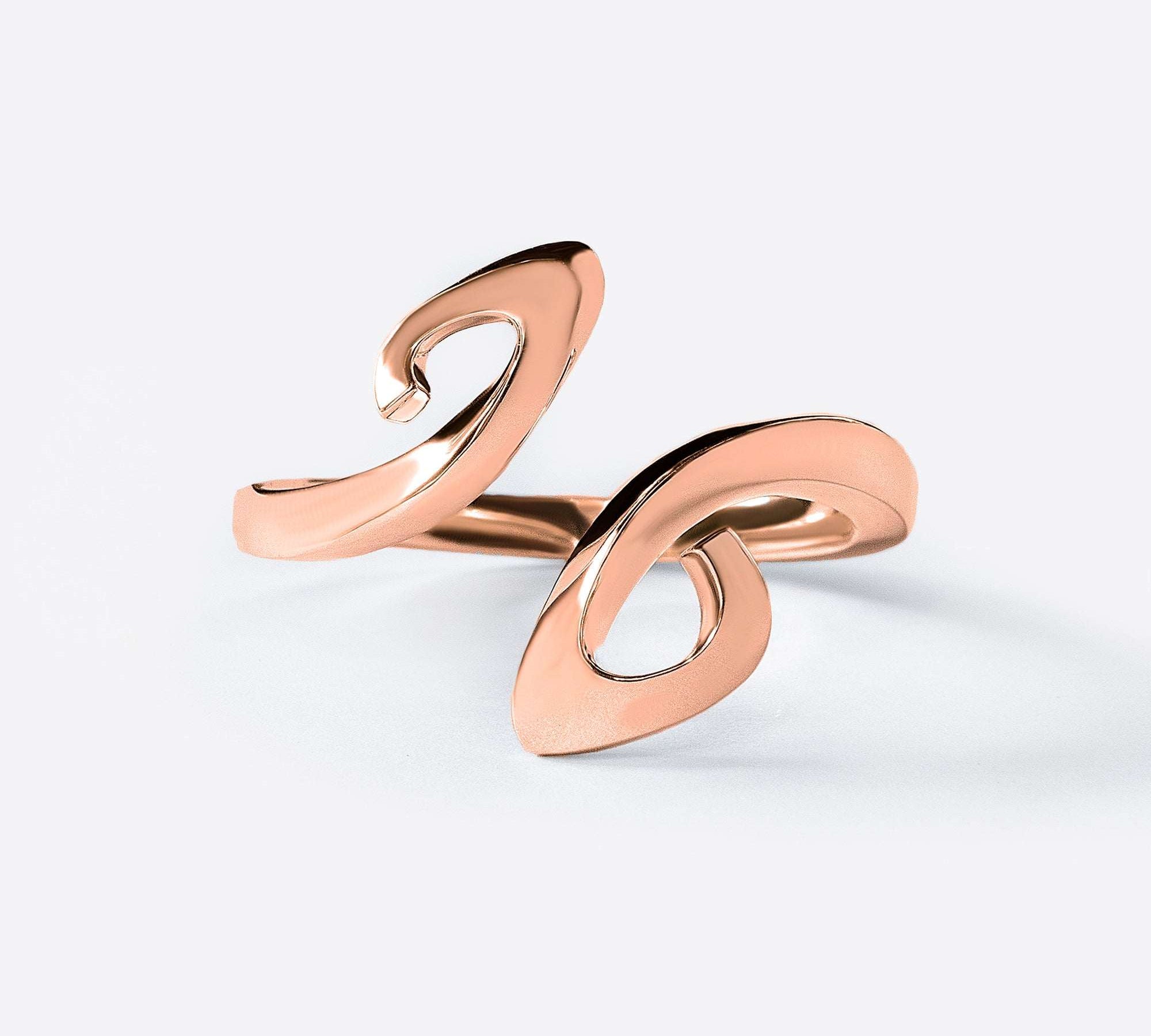 Rose gold Hydra Duo ring with double-looped open design on white background