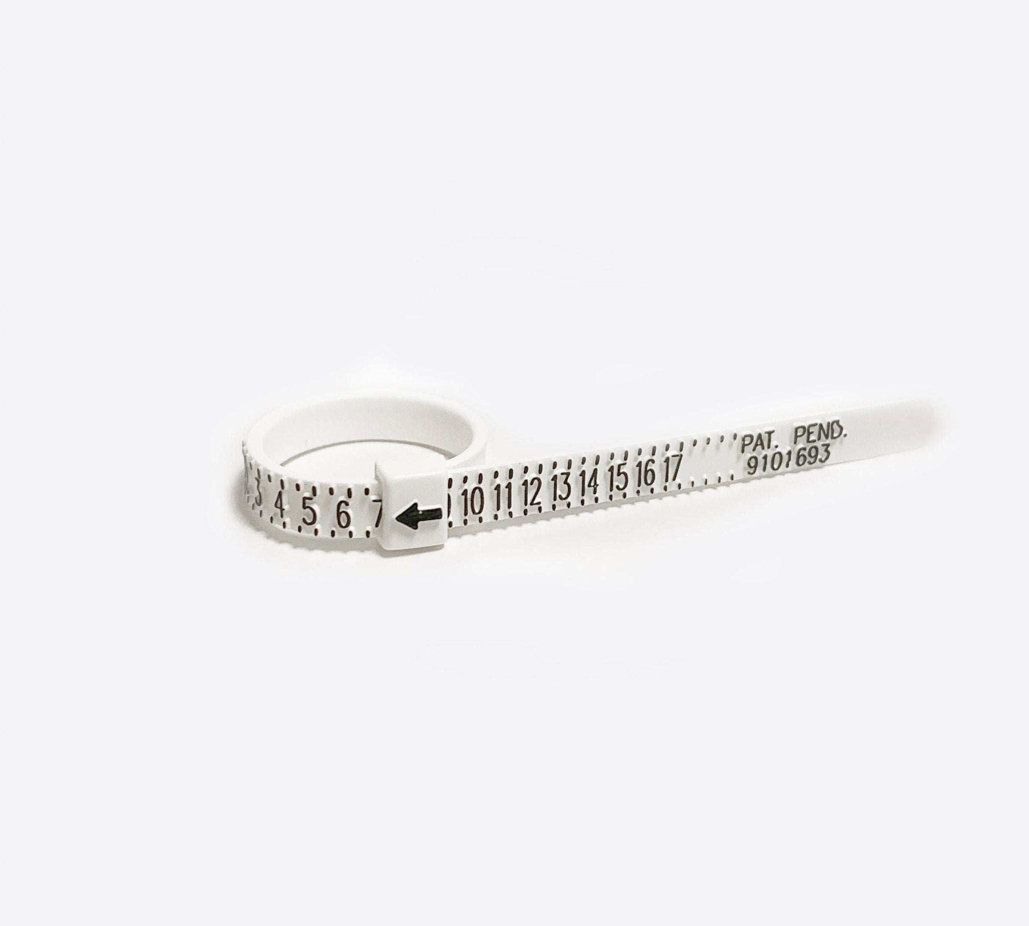 Adjustable white ring sizer measuring tool with black numbers and markings