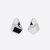 Sterling silver Prism earrings with faceted angular surfaces and a sculptural geometric design.