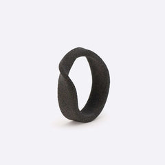 Gray nylon Amor Sample Ring with twisting band and textured surface, 6mm width, flexible fit, sample only.