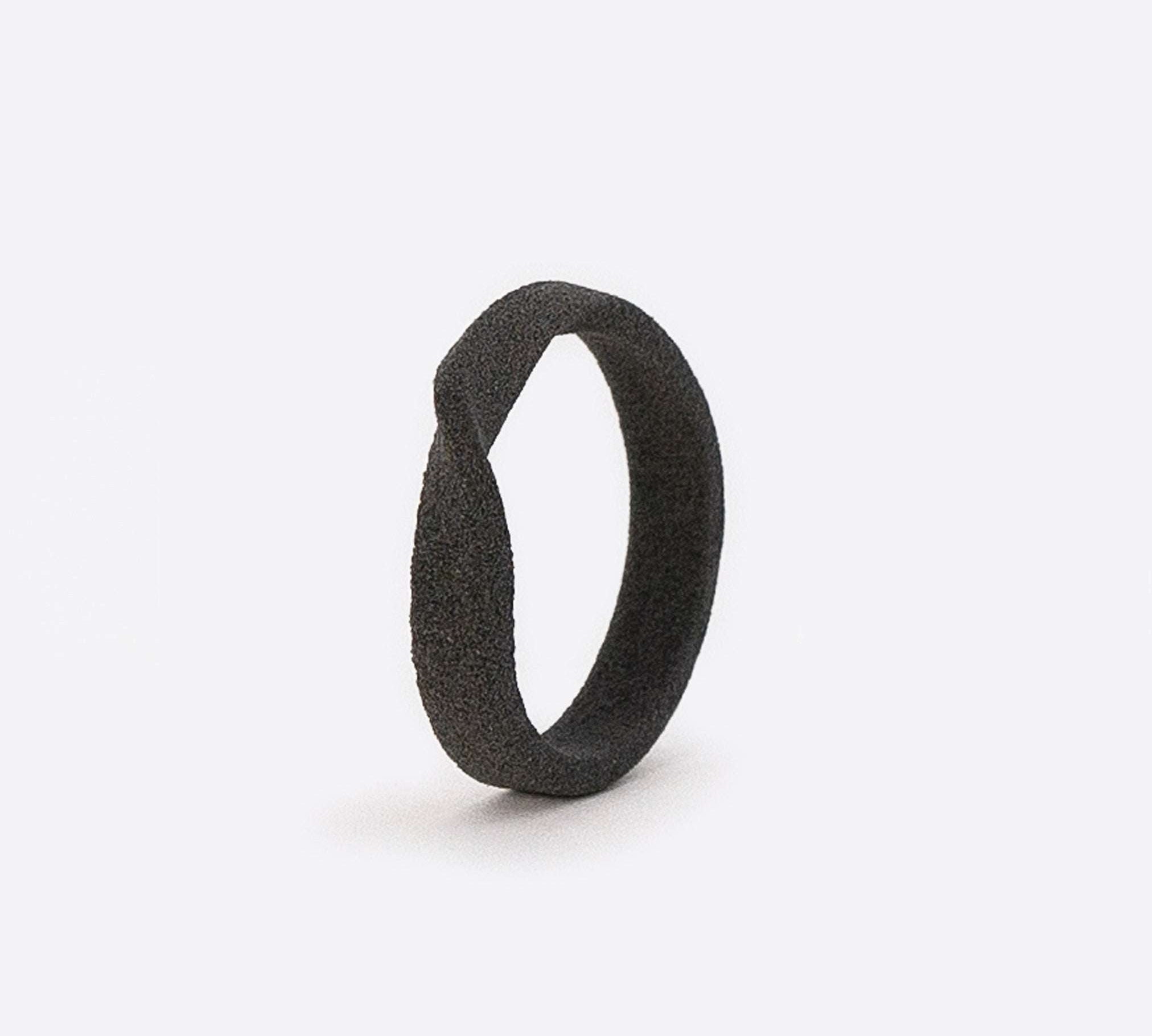 Gray nylon Amor Sample Ring with single twisting band design and precision edge detailing