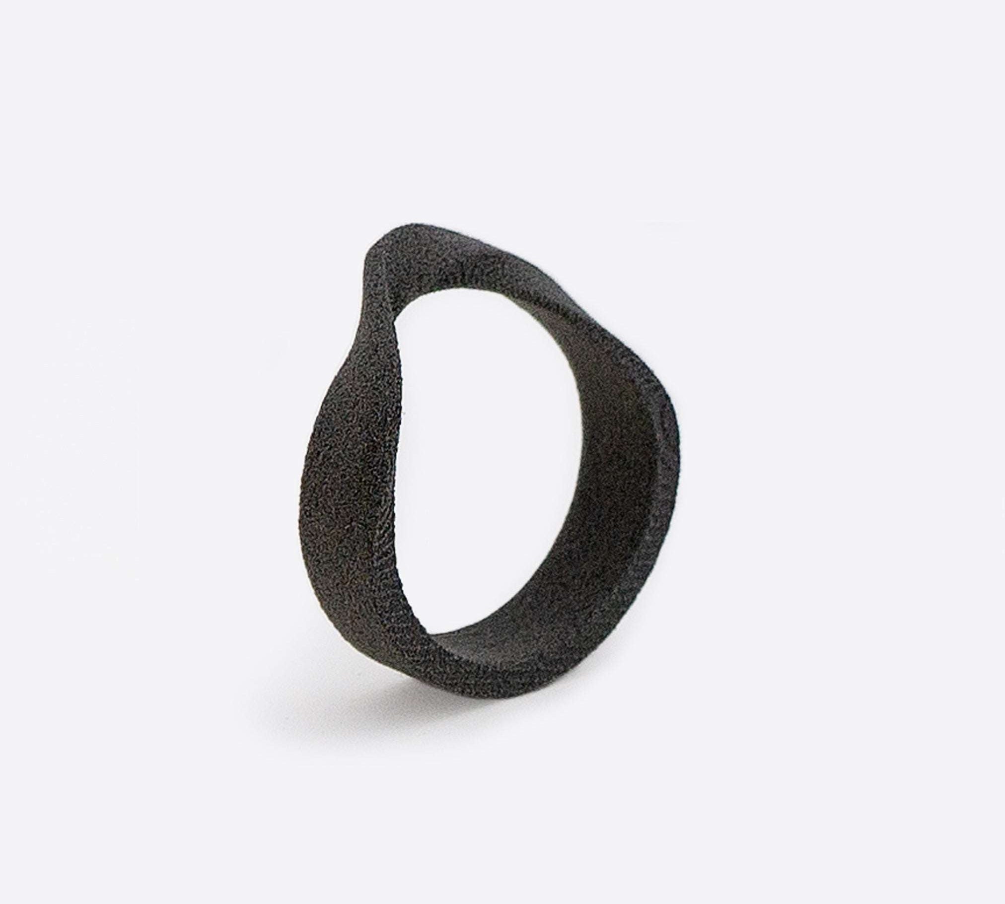Gray nylon Amos Sample Ring with twisting band and precision edge detailing against white background