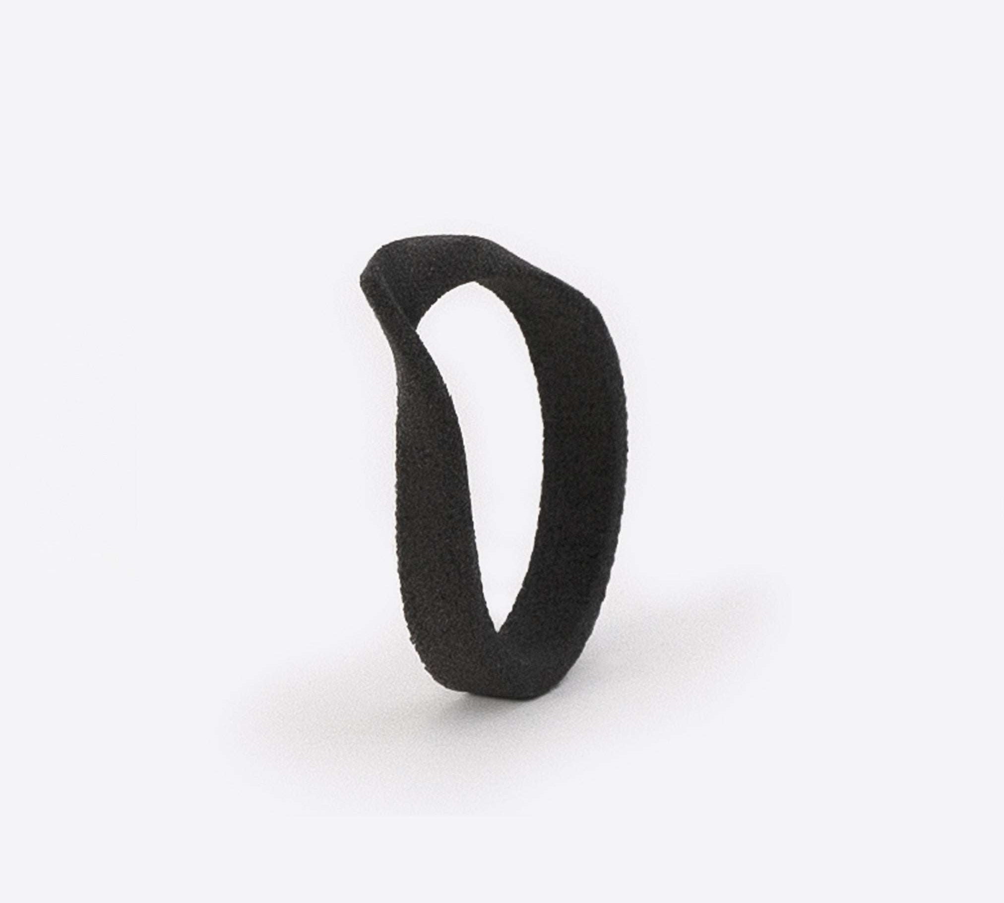 Gray nylon Amos Sample Ring with twisting band and precision edge detailing on white background