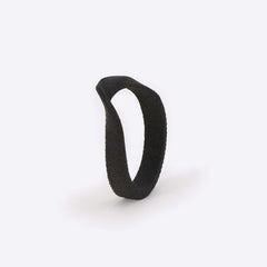 Gray nylon Amos Sample Ring with twisting band and precision edge detailing on white background