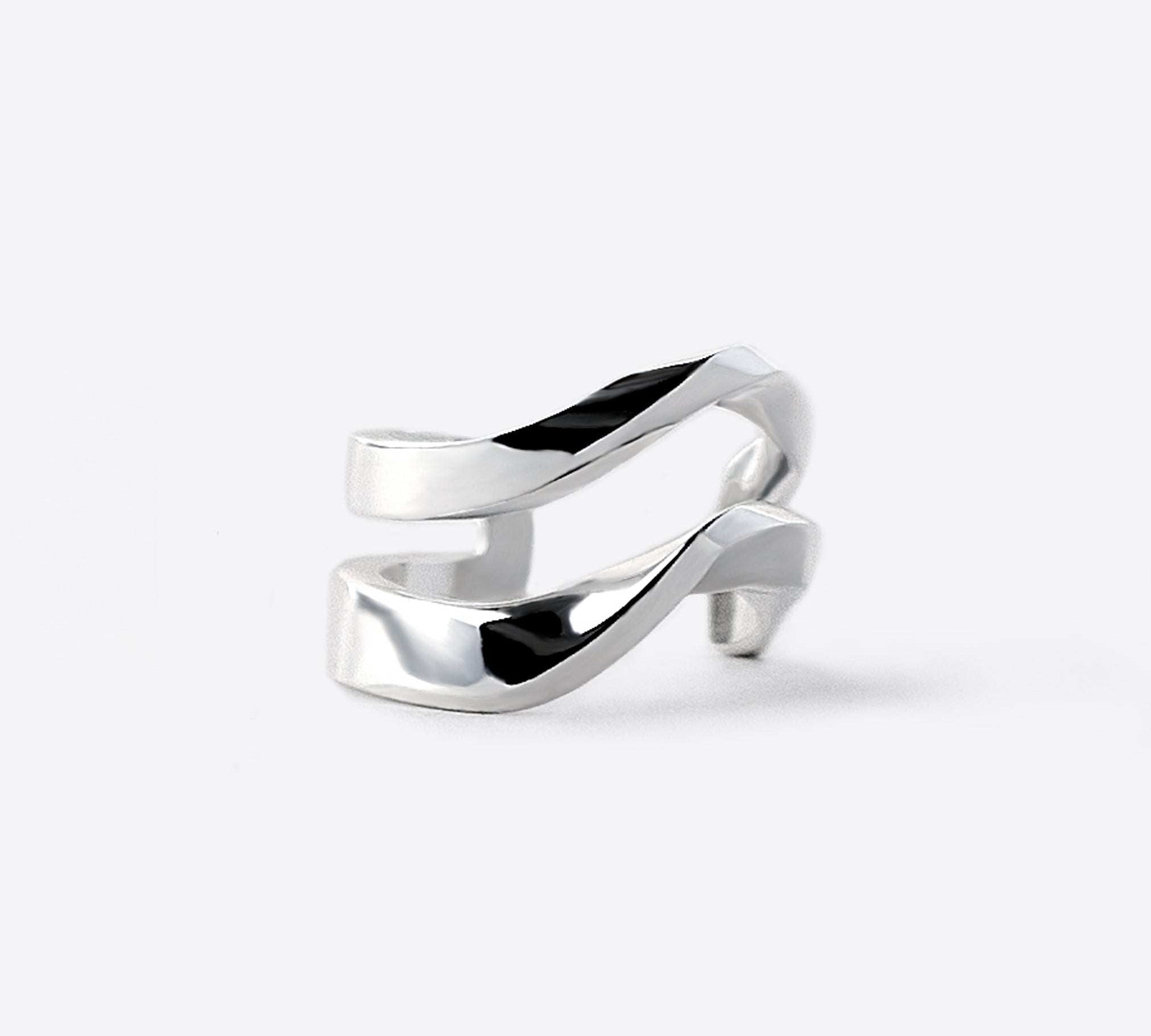 Sterling silver Linea Ear Cuff with two twisting parallel bands and modern design