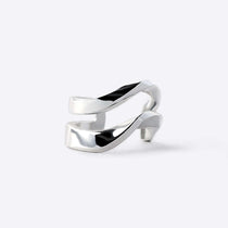 Sterling silver Linea Ear Cuff with two twisting parallel bands and modern design