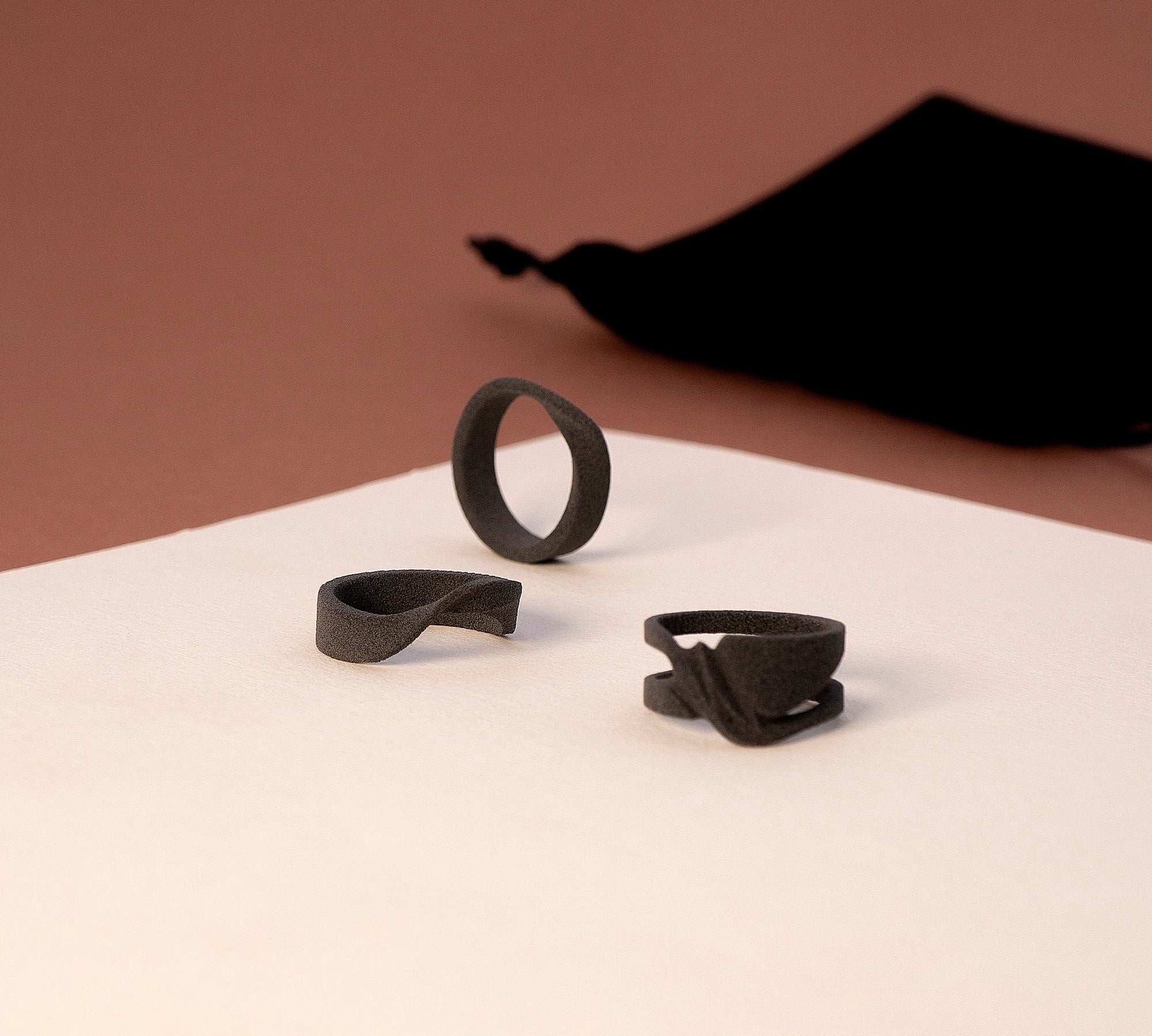 Men's Ring Samples Set of three black nylon designer ring samples with black velvet pouch