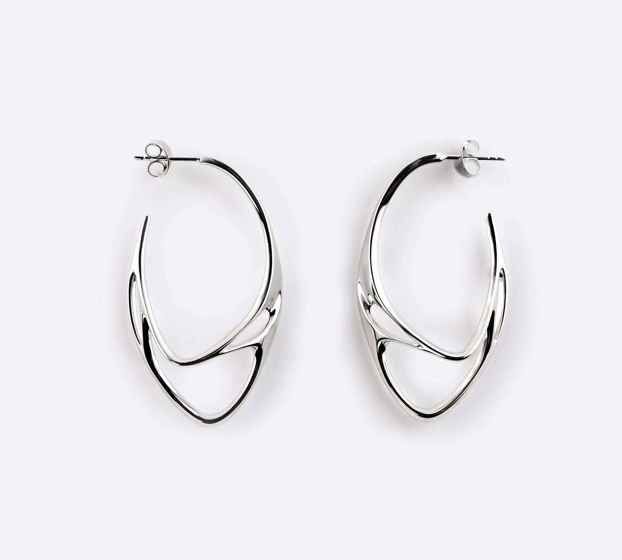 Sterling silver Eclipse Light earrings with two interlocking oval rings and polished finish