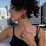side profile of Gemino earrings in black nylon