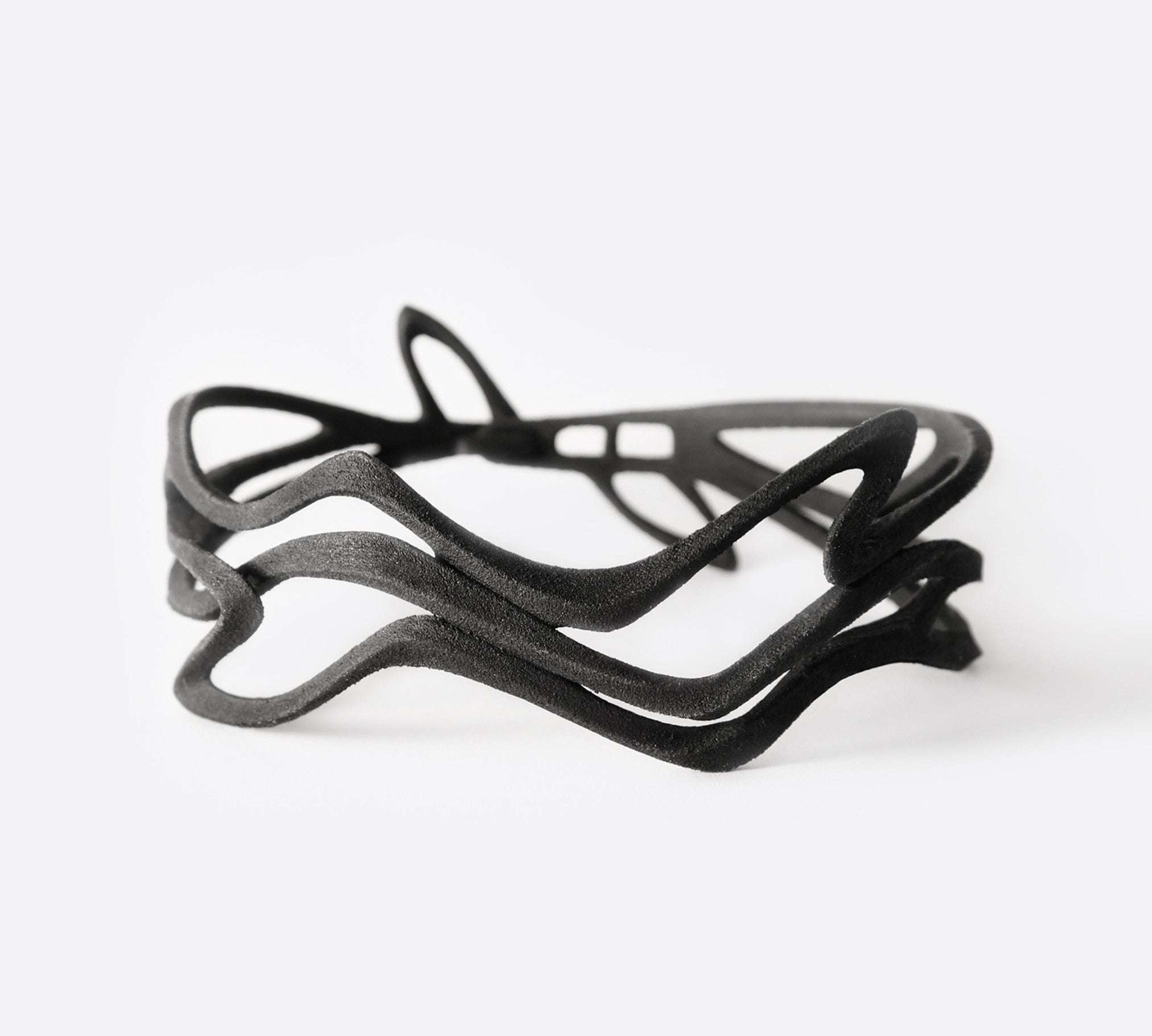 Black Legato NecklaceChoker with twisting, stacking curves and precision edges, 3D printed in flexible TPU polymer.