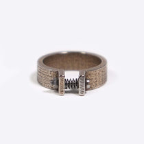 Machina Q 3D printed adjustable men's ring in stainless steel with mechanistic hardware and industrial design