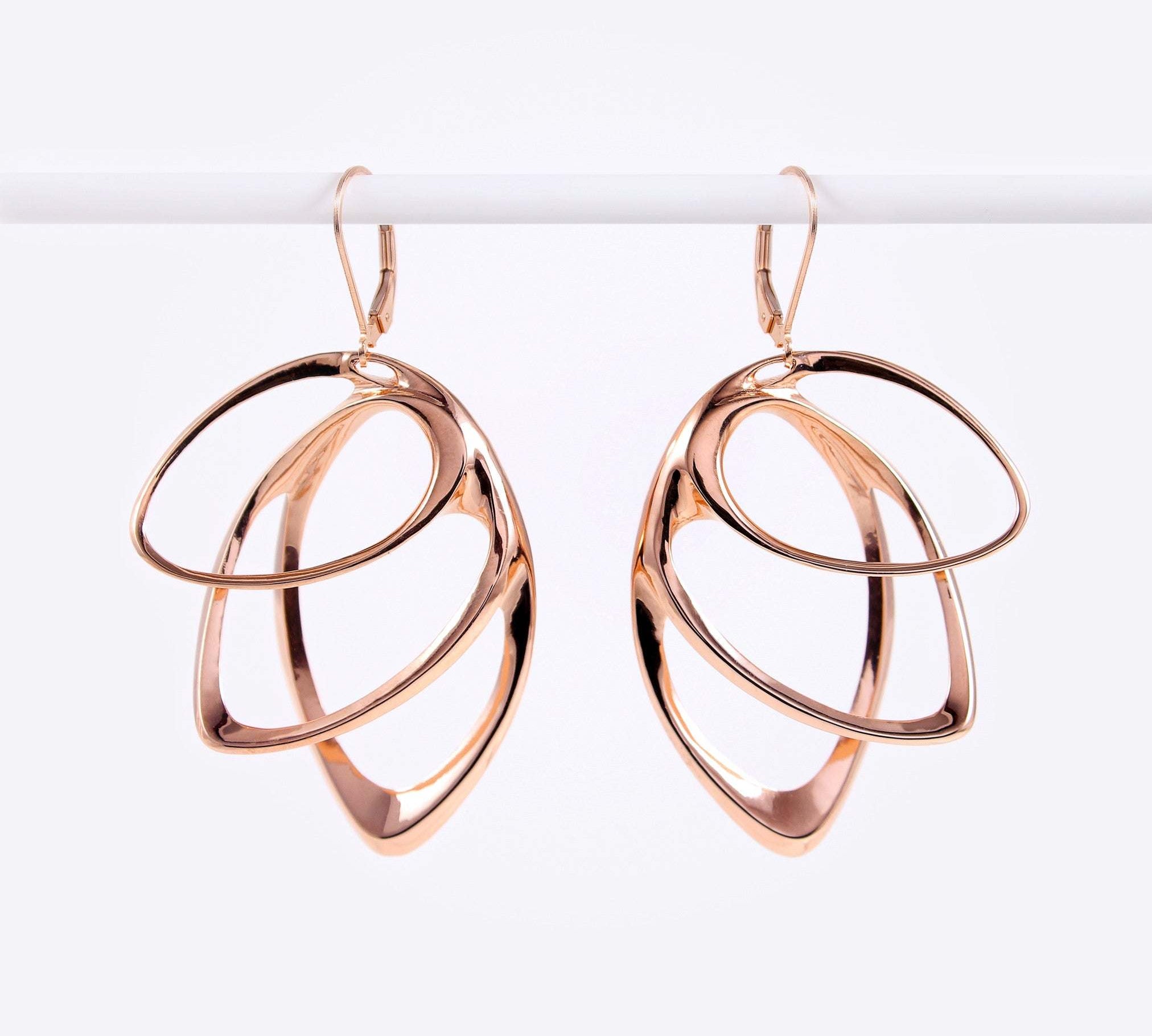 Rose gold Orbis earring with three elliptical petals in a cascading design, 1.7 by 1.2 inches.